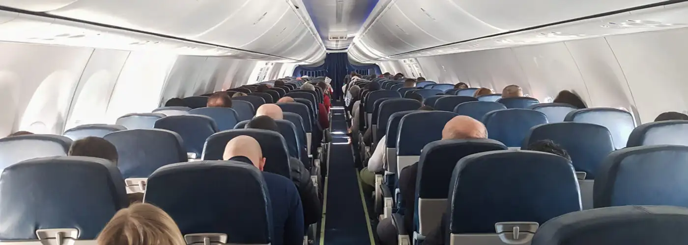 Interior of airplane with passengers