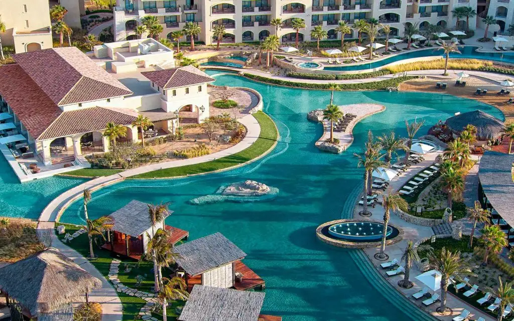 Aerial view of a large pool and surrounding buildings at Grand Solmar at Rancho San Lucas