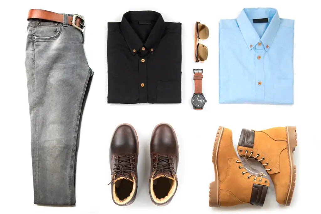 Men's casual outfits for man clothing with brown boot , watch, blue jeans, belt, wallet, sunglasses, office shirt and bracelet isolated on white background, Top view